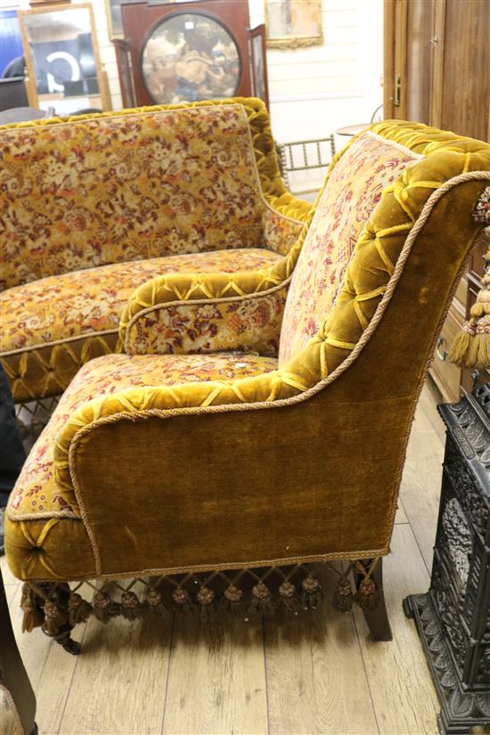 A Victorian three piece velvet covered sofa and a pair of armchairs, Sofa W.130cm